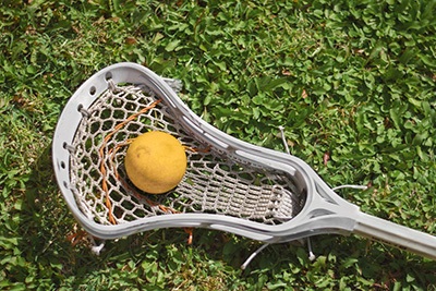 how to string a women's lacrosse stick
